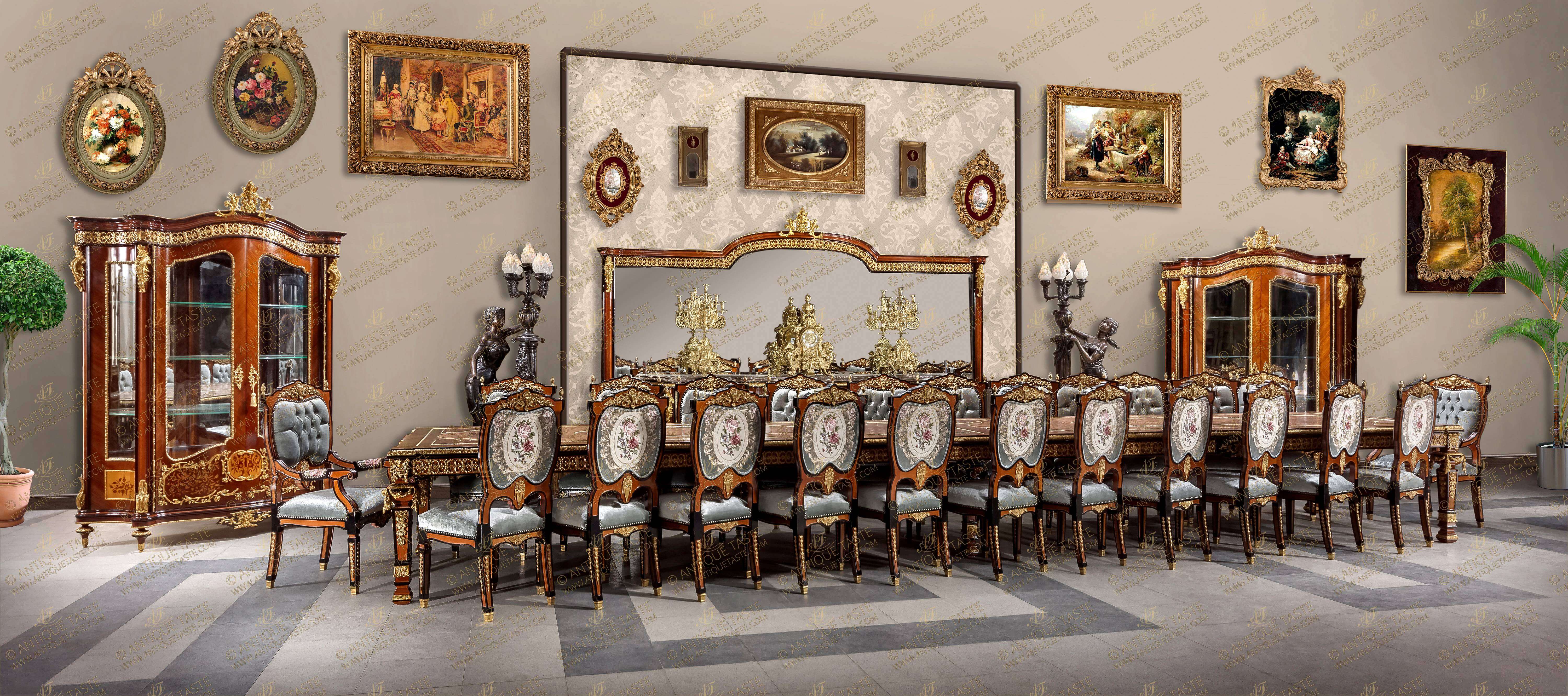 A spectacular, palatial and most detailed French Louis XIV aristocratic style twenty eight pieces Grand Dining Room Suite; extensively ormolu-mounted, veneer and marquetry inlaid; comprising of twenty two chairs, pair of arm chairs, six meters grand dining table, grand buffet with mirror and pair of display cabinets.